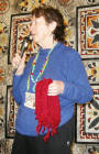 June Moes, Knitted neck scarf.